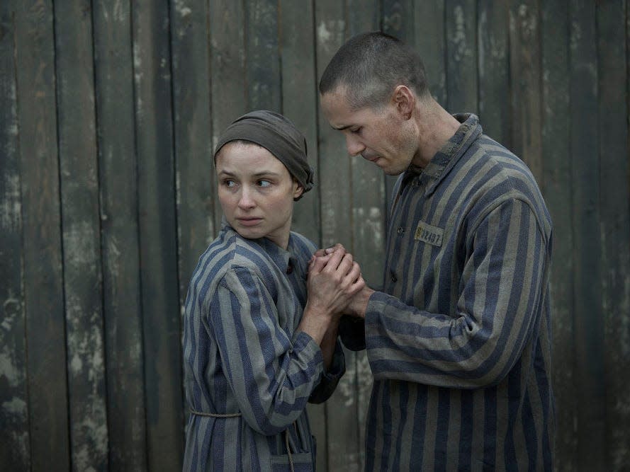Jonah Hauer-King as Lali Sokolov and Anna Próchniak as Gita Furman in "The Tattooist of Auschwitz"