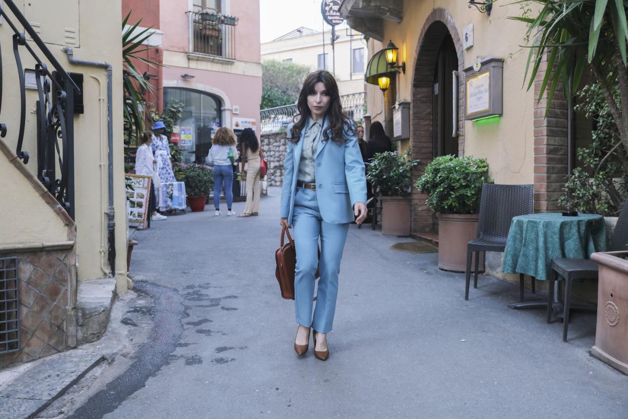 a person walking down a street