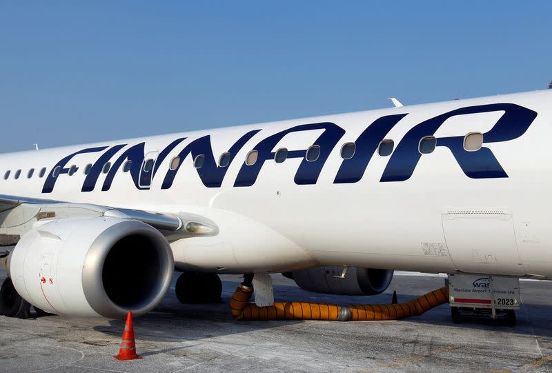 FILE PHOTO: A Finnair airplane is docked at the Chopin International Airport in Warsaw