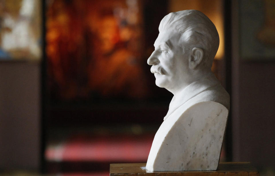 A bust of Soviet dictator Josef Stalin sits inside a museum dedicated to him in the town of Gori, some 80 kilometers (50 miles) west of the Georgian capital Tbilisi, Monday, April 9, 2012. A museum that has honored Josef Stalin in Georgia since 1937 is being remodeled to exhibit the atrocities that were committed during the Soviet dictator's rule. (AP Photo/Shakh Aivazov)