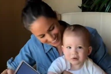 Meghan with her and Harry’s son ArchieApple TV