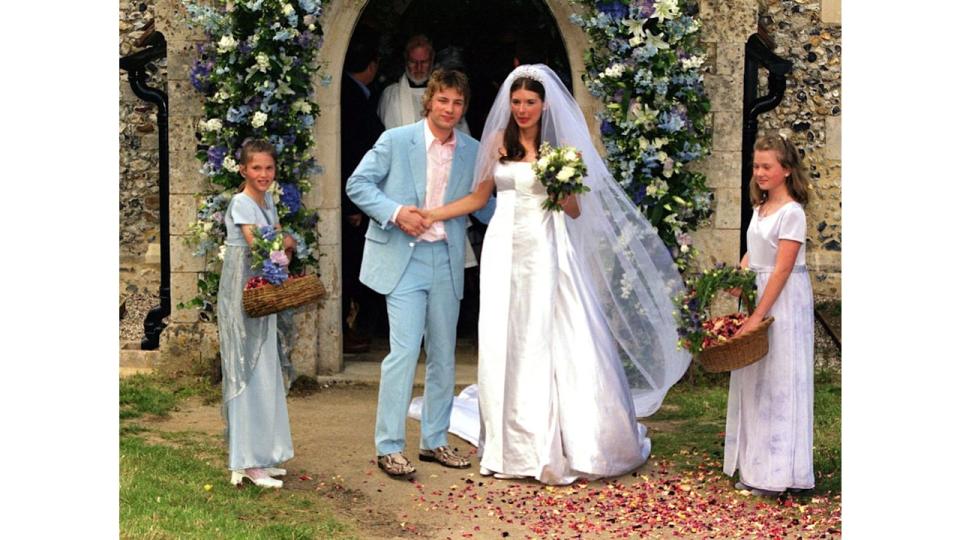 Celebrity television chef Jamie Oliver and his wife Jools after their wedding ceremony at All Saints Church, Rickling, in Essex. 