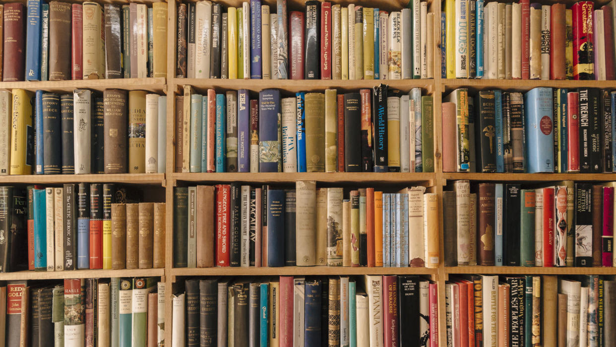  A stock photo of old books on shelves. 