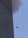 A man fall to his death from the World Trade Center after two planes hit the building September 11, 2001 in New York City. (Photo by Jose Jimenez/Primera Hora/Getty Images)