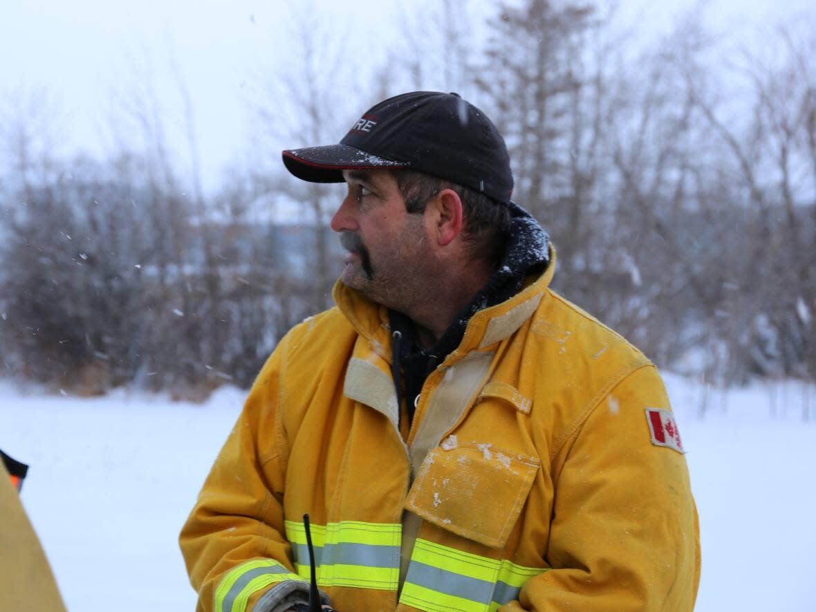 Glendon Station Fire Chief, Dan Amalia, responded to a truck rollover along the highway only to discover the woman inside the vehicle was the wife another firefighter.  (Ariel Fournier/CBC - image credit)
