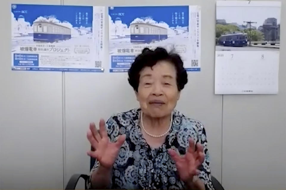 In this image made from video, Tetsuko Shakuda speaks during a video interview in Hiroshima, western Japan, Monday, Aug. 3, 2020. Shakuda was a frightened 14-year-old when she resumed her work as a conductor on a tram line in the devastated city of Hiroshima, just three days after the atomic bomb exploded 75 years ago, badly damaging the tracks and most of the trams. The U.S. first atomic bomb that exploded on Aug. 6, 1945, changed everything. As that first tram on Aug. 9 moved through Hiroshima, it passed huge piles of rubble and decomposing bodies. (AP Photo)