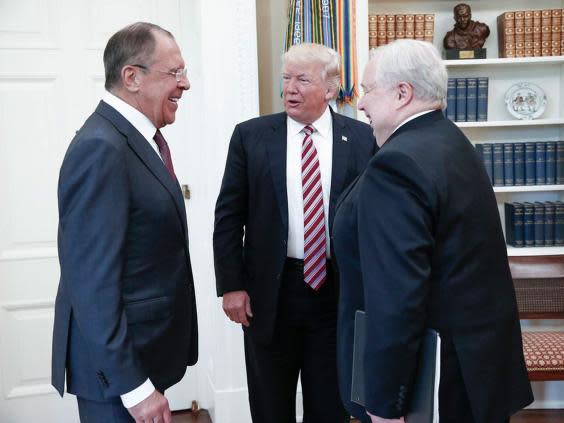 A Russian foreign ministry photo showing Donald Trump with Sergey Lavrov and Russian Ambassador Sergey Kislyak during their meeting in the White House on 10 May, 2017 (EPA)