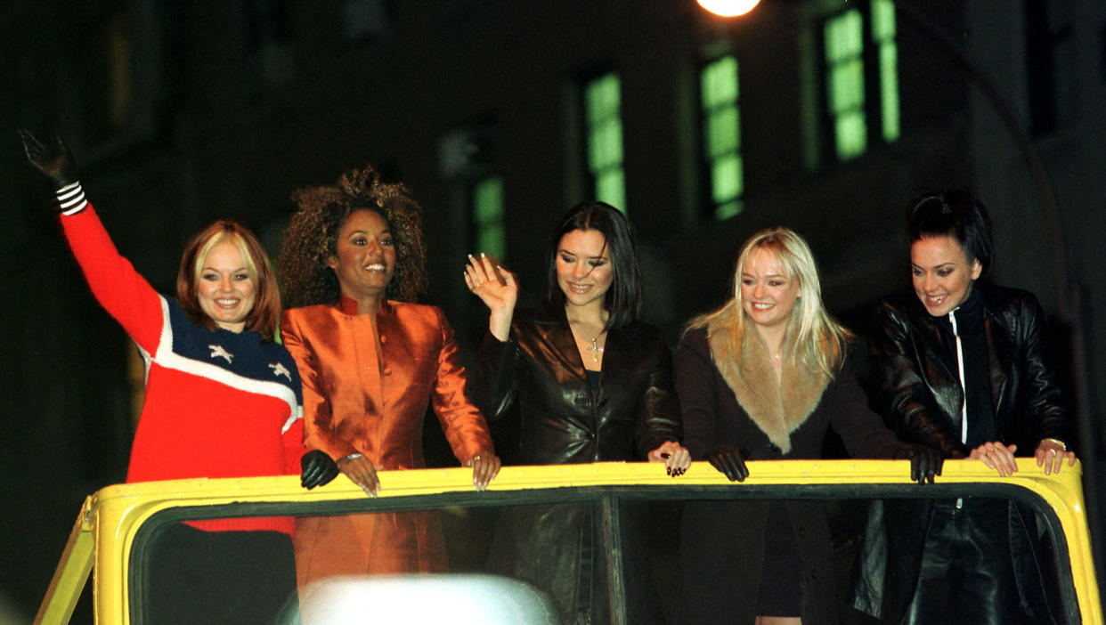 The group the Spice Girls arrive on a double decker bus at New York's Planet Hollywood, January 14. The Spice Girls were making an appearance at the theme restaurant to donate memorabilia from their new movie 