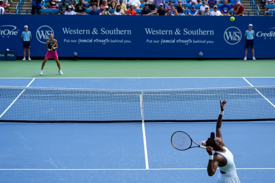 Venus Williams, of the United States, serves the ball to Qinwen Zheng, of China, during the Western & Southern Open at the Lindner Family Tennis Center in Mason on Wednesday, Aug. 16, 2023.