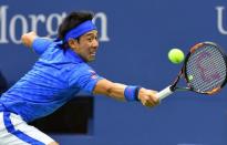 Sept 7, 2016; New York, NY, USA; Kei Nishikori of Japan hits the ball while playing Andy Murray of Great Britain on day ten of the 2016 U.S. Open tennis tournament at USTA Billie Jean King National Tennis Center. Robert Deutsch-USA TODAY Sports