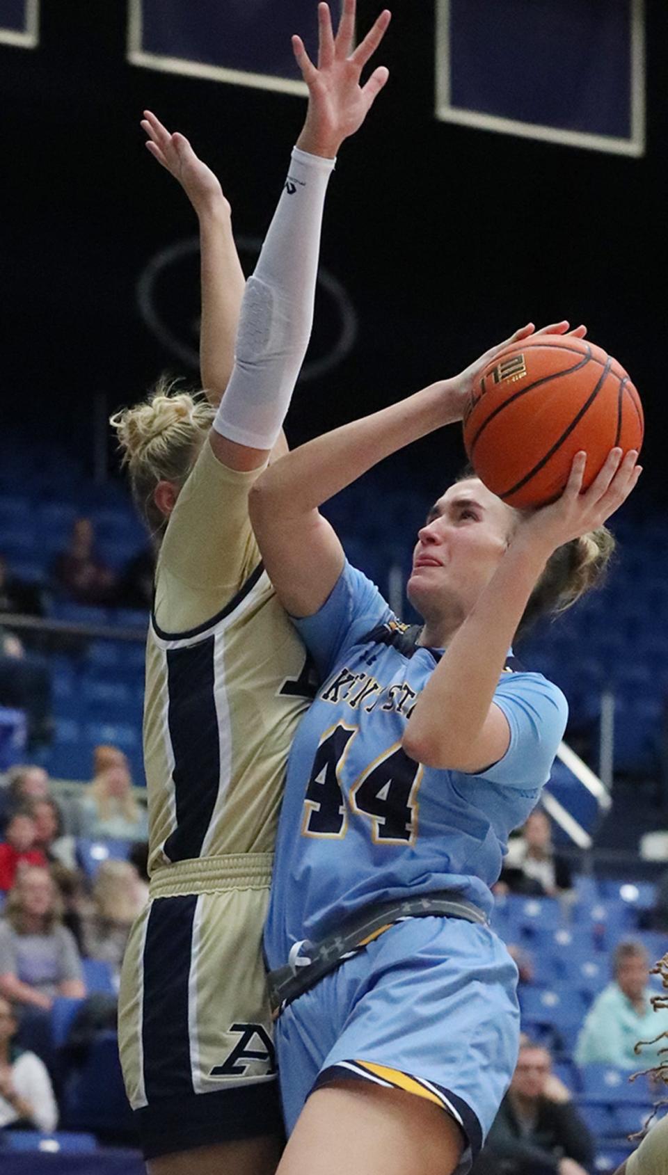 Kent State's Lindsey Thall goes to the basket as Akron's Molly Neitzel defends Wednesday, Feb. 1, 2023, at Rhodes Arena.