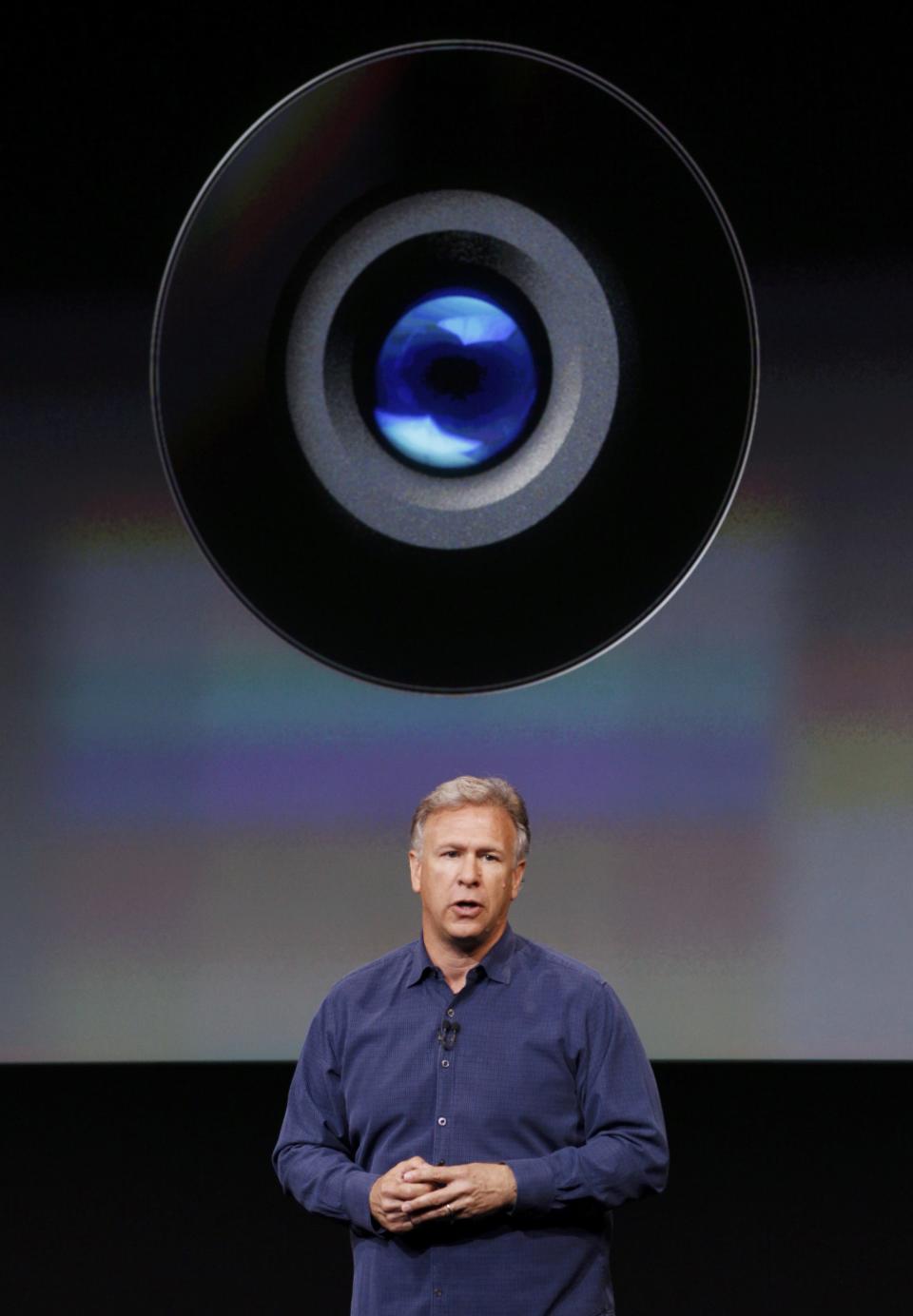 Phil Schiller, senior vice president of worldwide marketing for Apple Inc, talks about the camera in the new iPhone 5S during Apple Inc's media event in Cupertino