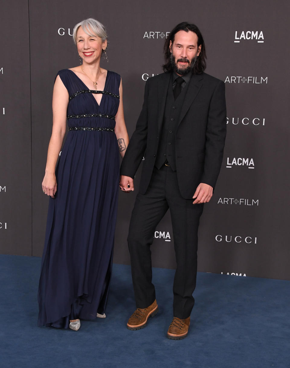 A photo of Alexandra Grant and Keanu Reeves on the red carpet at the 2019 LACMA Art + Film Gala at LACMA on November 02, 2019 in Los Angeles, California.