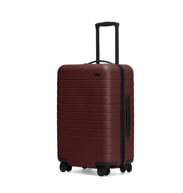 <strong><a href="https://www.awaytravel.com/luggage/bigger-carry-on/brick" target="_blank" rel="noopener noreferrer">The Bigger Carry-On from Away</a></strong> is the perfect nudge to get your loved one come visit you. The sleek, guaranteed-for-life bag fits all major U.S. airlines carry-on restrictions. There&rsquo;s even an ejectable battery to keep phones and tablets fully charged while on the road.