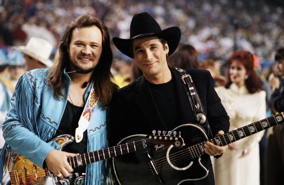 Country singer Travis Tritt (left) and Clint Black pose together before the half-time show at the 1994 Atlanta, Georgia, Superbowl XXVII football game held at the Georgia Dome. (Photo by George Rose/Getty Images)