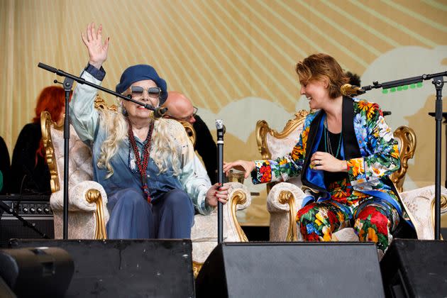Joni Mitchell (left) and Brandi Carlile perform at the 2022 Newport Folk Festival. (Photo: Boston Globe via Getty Images)
