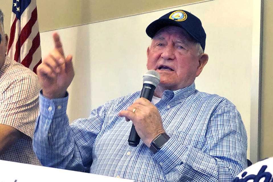 U.S. Agriculture Secretary Sonny Perdue speaks at an Ag Policy Summit during a visit Wednesday, Aug. 28, 2019 to Decatur, Ill. Perdue has sought to assuage farmers' fears of financial problems after China halted purchases of U.S. farm products in an escalating trade war. (AP Photo/John O'Connor)