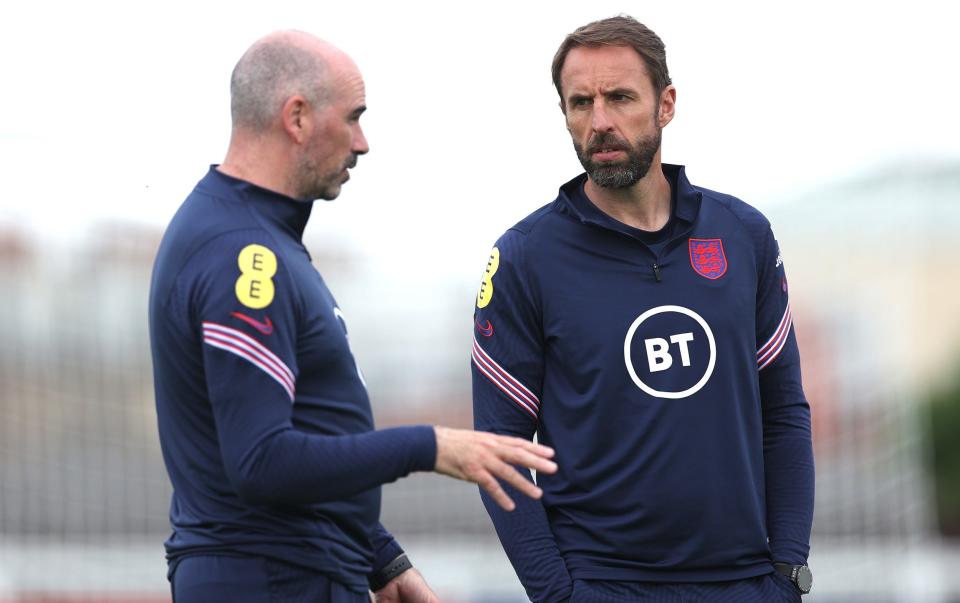 Mitchell and Southgate chatting during an England training session at St George's Park - GETTY IMAGES