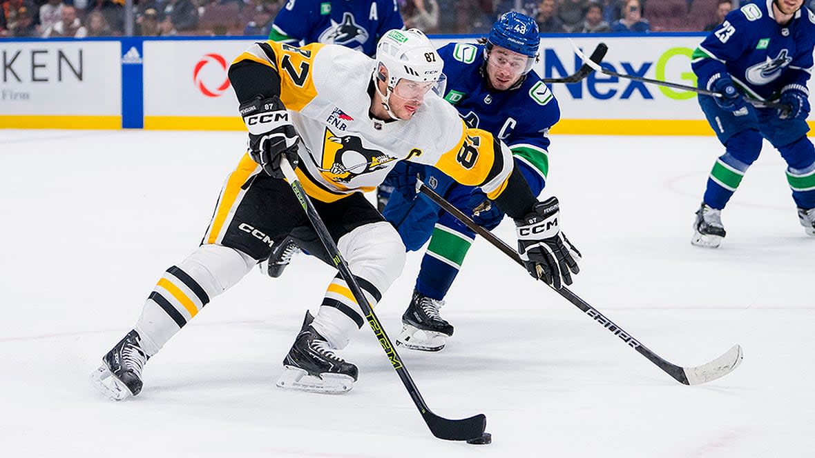 Penguins forward Sidney Crosby, left, reached 1,000 even-strength points in the NHL on Tuesday night, the fourth fastest to do in 1,246 games. (Bob Frid-USA TODAY Sports/Reuters - image credit)