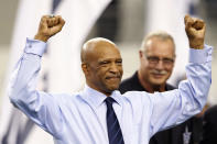 FILE - In this Nov. 6, 2011, file photo, former Dallas Cowboys player Drew Pearson reacts during an induction ceremony into the Cowboys Ring of Honor at halftime of an NFL football game against the Seattle Seahawks in Arlington, Texas. Pearson will be inducted into the Pro Football Hall of Fame on Aug. 8, 2021. (AP Photo/Jim Cowsert, File)