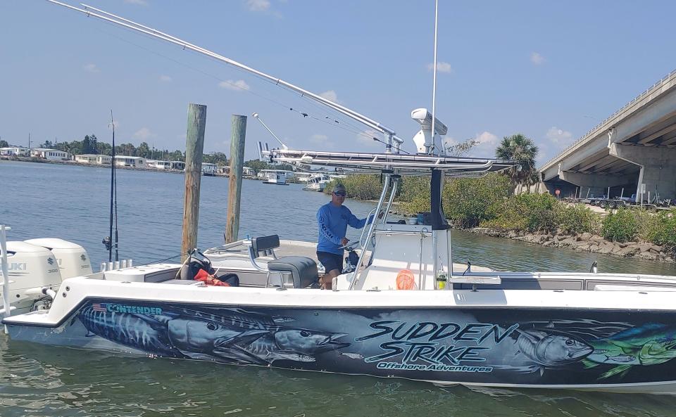 Capt. Scott Housel aboard his busy charter boat.