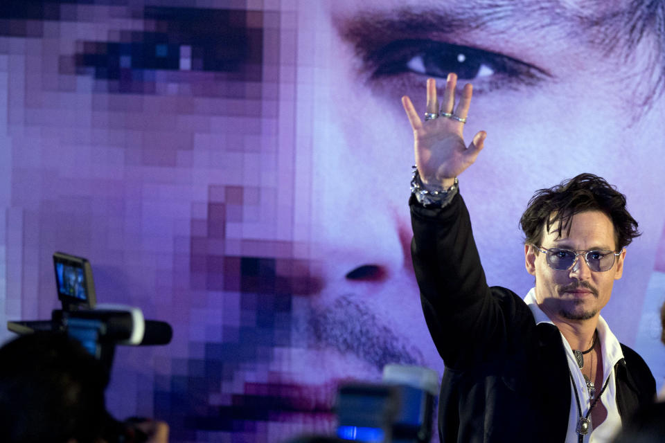 FILE - In this Monday, March 31, 2014 file photo, actor Johnny Depp attends a promotional event for his new movie “Transcendence” in Beijing, China. The film releases in the US on April 18, 2014. (AP Photo/Alexander F. Yuan)