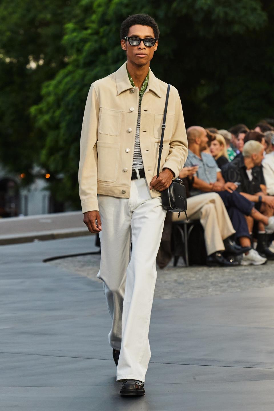 Ami shows off a sophisticated white denim look for SS23 (Ami)