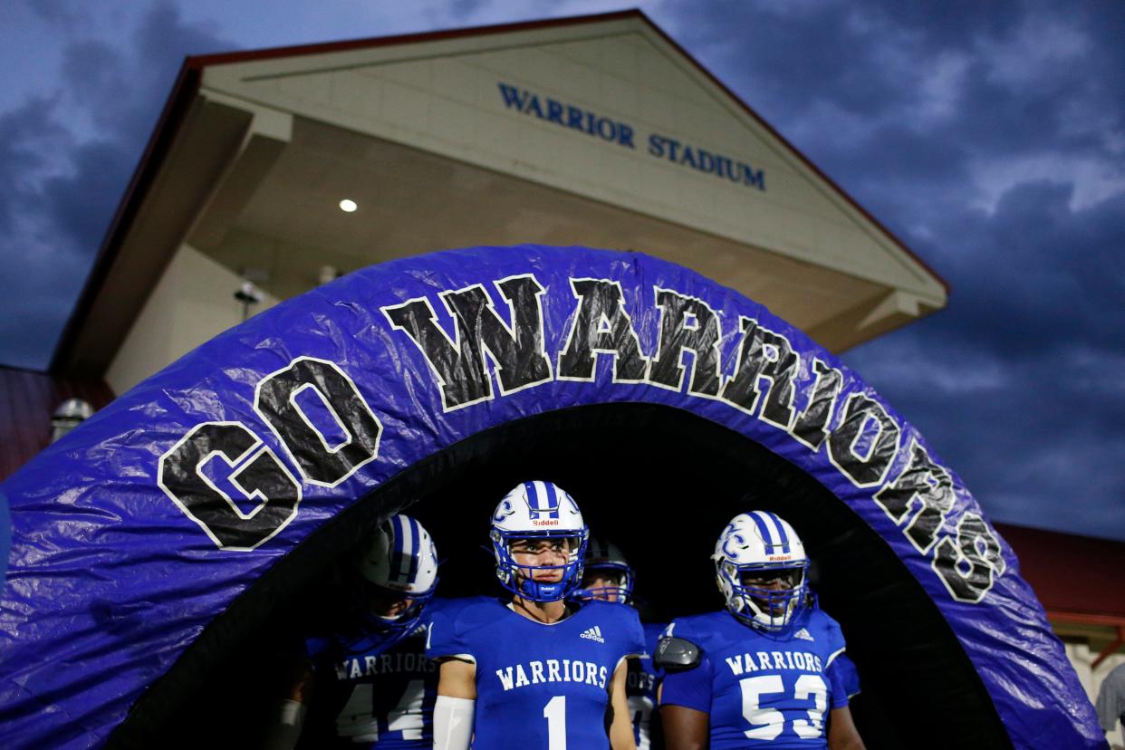 Oconee County gets ready to take the field before the start of a GHSA high school football between Cedar Shoals and Oconee County in Watkinsville, Ga., on Friday Aug. 27, 2021. Oconee County won 27-19. (Photo/Joshua L. Jones, Athens Banner-Herald)
