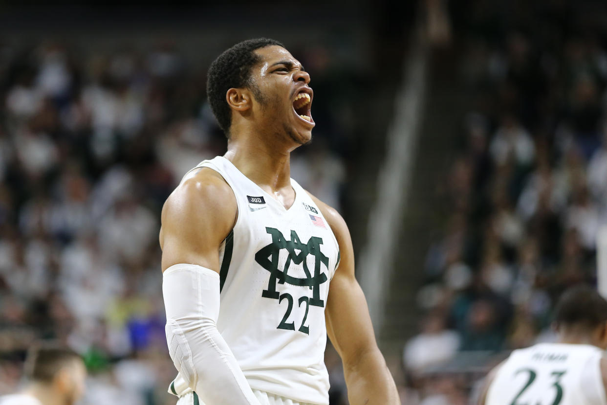 Miles Bridges celebrates his dunk. (Getty Images)