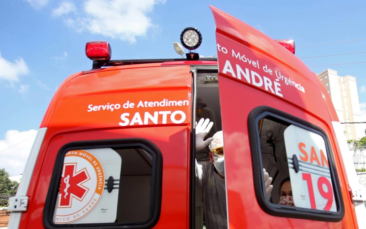 A nurse of Emergency Rescue Service (SAMU) transports a patient from a basic heath unit to a hospital during the spread of the coronavirus disease - REUTERS