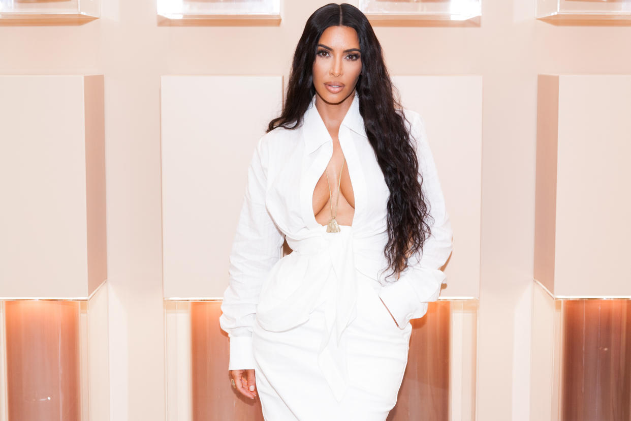 Kim Kardashian received a backlash from fans after naming her shapewear brand Kimono. [Photo: Getty]