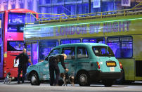 <p>Police sniffer dogs on London Bridge as police are dealing with a “major incident” at London Bridge. (Dominic Lipinski/PA Images via Getty Images) </p>