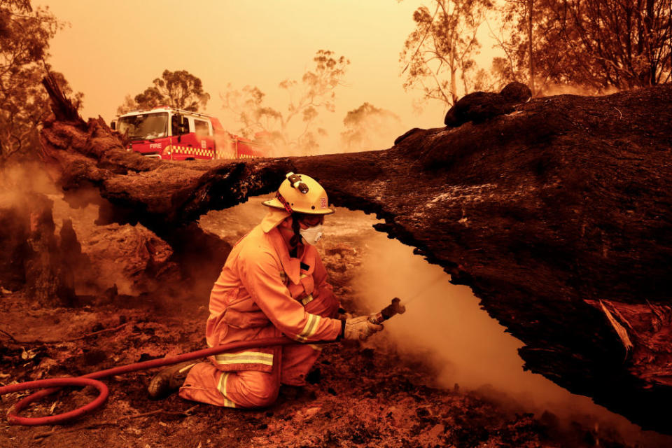 Fire crews put out spot fires on January 04, 2020 in Sarsfield, Australia