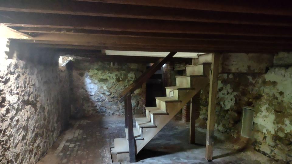 a staircase in a stone building