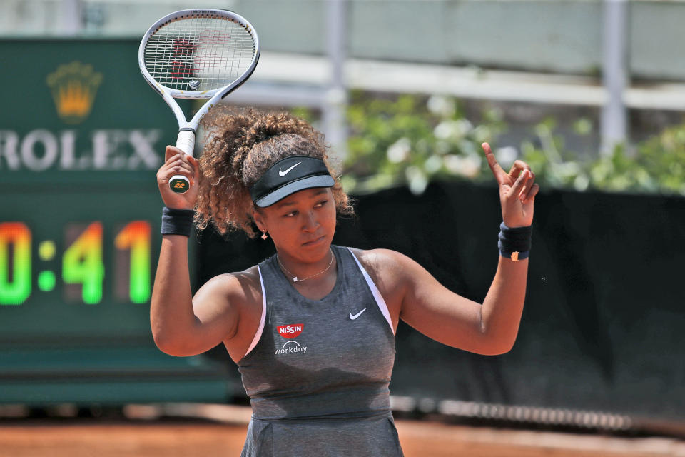 Naomi Osaka of Japan reacts after losing a point against Jessica Pegula of the United States during their match at the Italian Open tennis tournament, in Rome, Wednesday, May 12, 2021. Osaka lost against Pegula 7-6, 6-2. (AP Photo/Alessandra Tarantino)