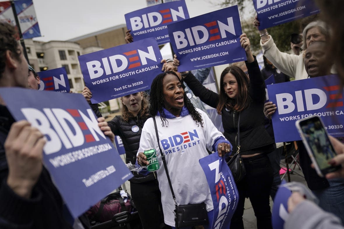 Supporters of then-Democratic presidential candidate Joe Biden rally ahead of the Democratic presidential debate on Feb. 25, 2020 outside of the Charleston Gaillard Center in Charleston, South Carolina. (Photo by Drew Angerer/Getty Images)