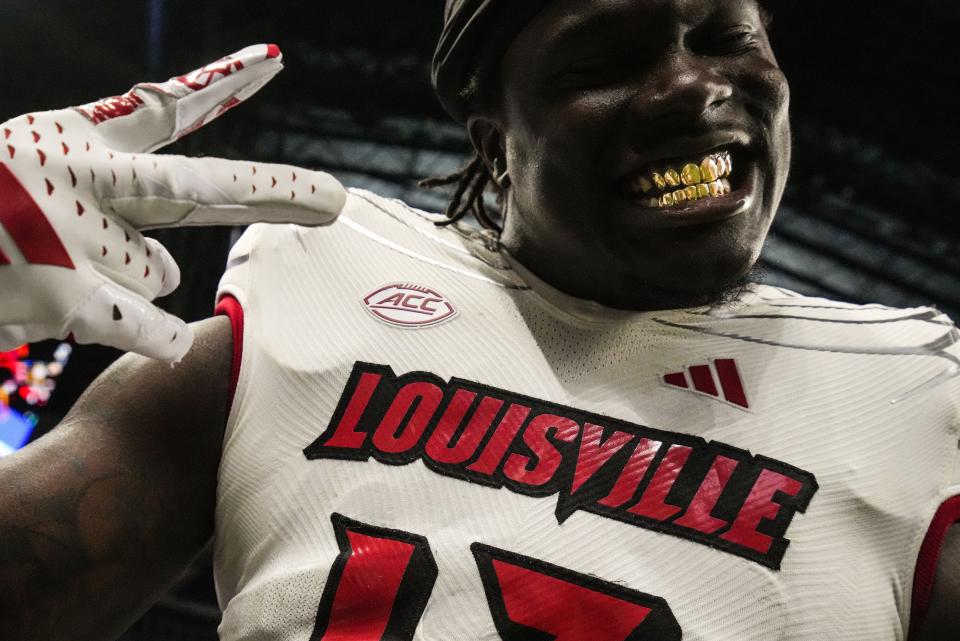 Louisville Cardinals defensive back Gilbert Frierson (13) celebrates Saturday, Sept. 16, 2023, after the game against the Indiana Hoosiers at Lucas Oil Stadium in Indianapolis. The Louisville Cardinals defeated the Indiana Hoosiers, 21-14.