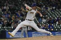 Milwaukee Brewers' Josh Hader throws during the ninth inning of a baseball game against the Pittsburgh Pirates Sunday, April 18, 2021, in Milwaukee. (AP Photo/Morry Gash)