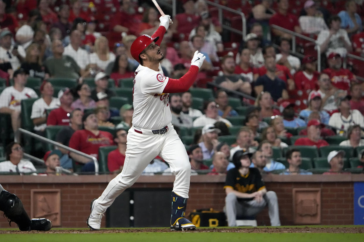 St. Louis Cardinals' Nolan Arenado hits a sacrifice fly to score Masyn Winn during the eighth inning of a baseball game against the Pittsburgh Pirates Tuesday, Sept. 17, 2024, in St. Louis. (AP Photo/Jeff Roberson)