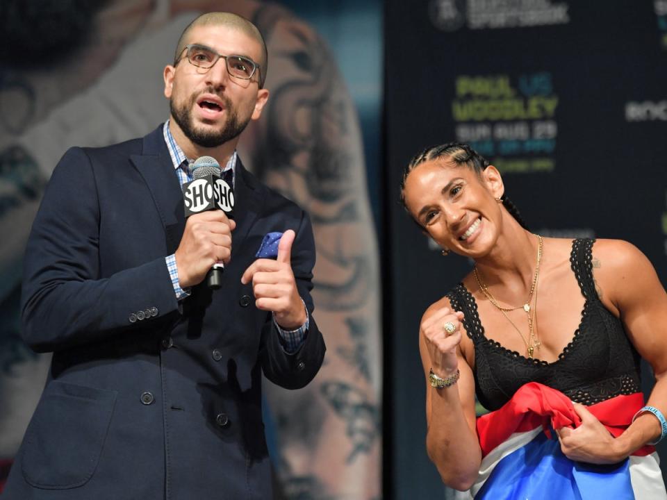 Ariel Helwani, pictured with boxing world champion Amanda Serrano, is a multi-time MMA Journalist of the Year award winner (Getty Images)