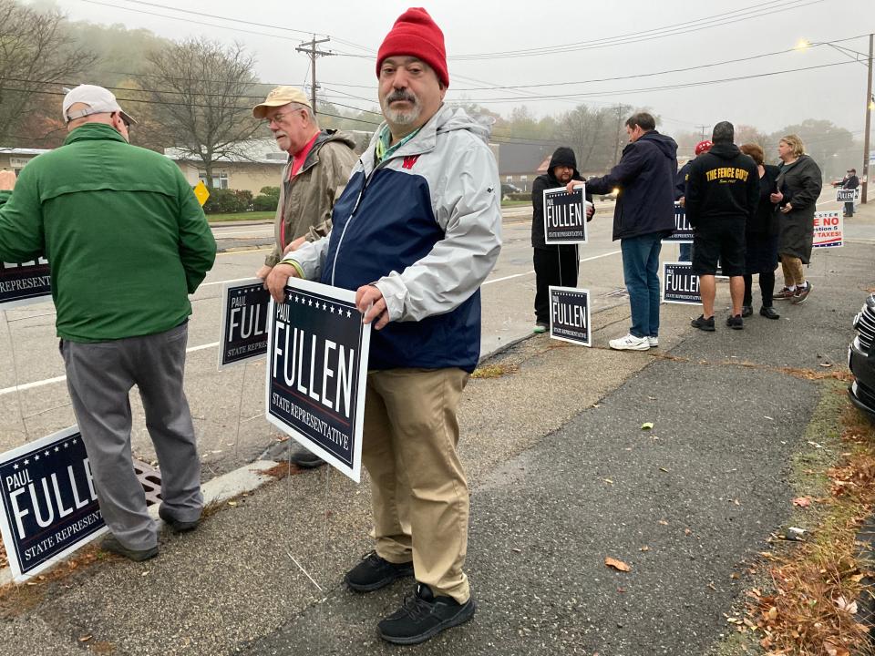 Fred Nathan shows his support for Republican Paul Fullen before the debate between candidates for the House seat representing the 17th Worcester District.