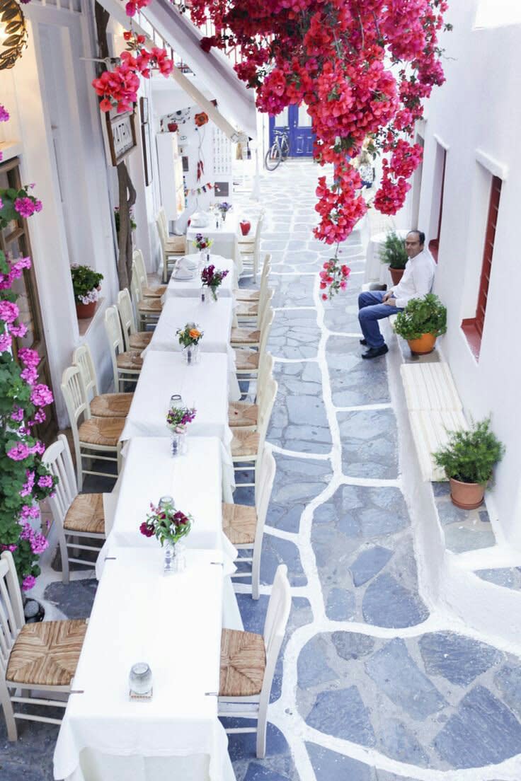 Mykonos is whitewashed picture-perfect with narrow and twisting cobblestone alleyways [KWB PRODUCTIONS]