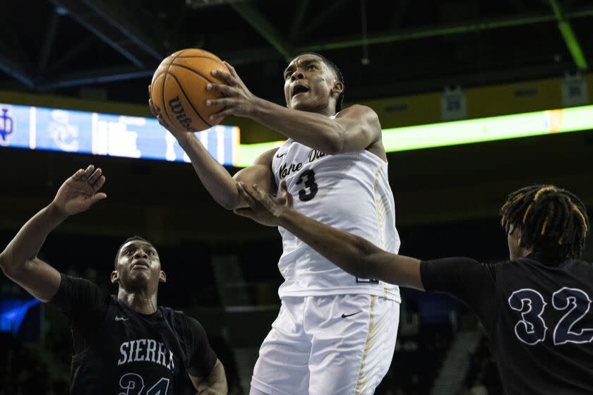 Los Angeles, CA - January 27: Notre Dame's Caleb Foster (3) goes up for a basket during a Mission League game against Sierra Canyon at Pauley Pavilion. (Kyusung Gong / For the LA Times)