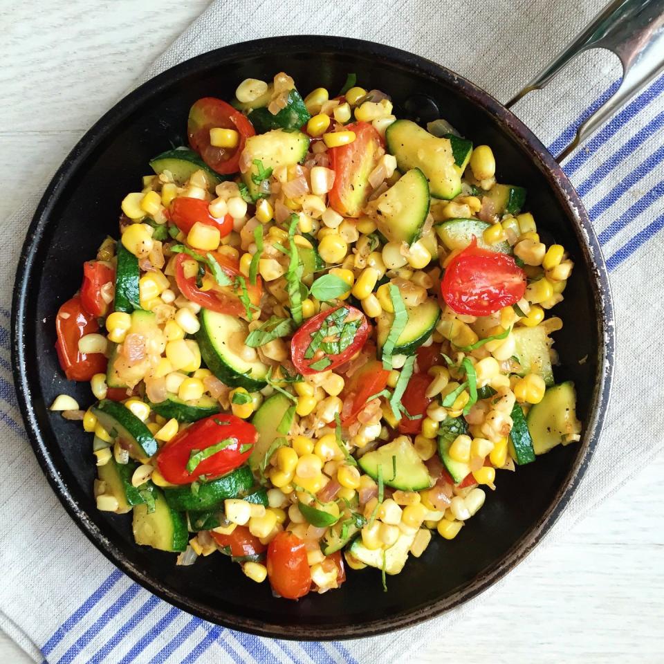 <p>There's so much going on in this skillet, and we are not mad about it.</p><p><span>Get the recipe from</span> <a href="https://www.delish.com/cooking/recipe-ideas/recipes/a43522/corn-zucchini-tomato-saute-recipe/" rel="nofollow noopener" target="_blank" data-ylk="slk:Delish;elm:context_link;itc:0;sec:content-canvas" class="link ">Delish</a><span>.</span></p>