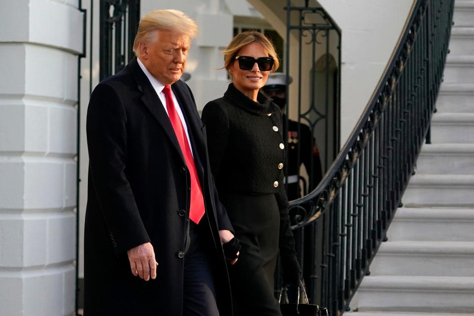 President Donald Trump and first lady Melania Trump leave the White House for the last time in his term Jan. 20, 2021.