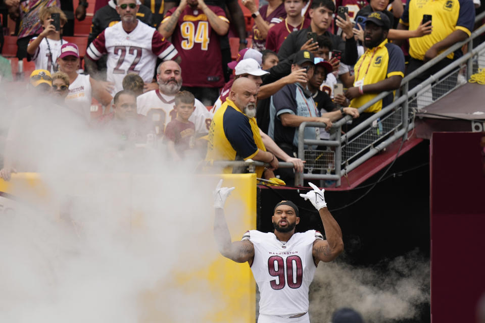 Washington Commanders defensive end Montez Sweat (90) takes to the field before the start of the first half of an NFL preseason football game against the Arizona Cardinals, Sunday, Sept. 10, 2023, in Landover, Md. (AP Photo/Alex Brandon)