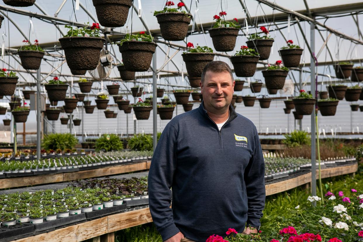 Jim Ramsey, owner, stands inside of the Greenhouse at Mile Tree Lawn and Garden LLC on March 30, 2023, in Clarksburg, Ohio.