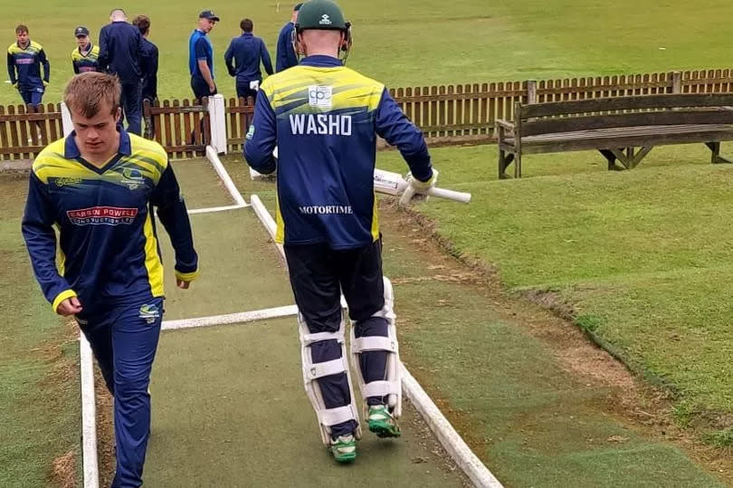 Louis Washington walks out to bat on his return to cricket action at the weekend.