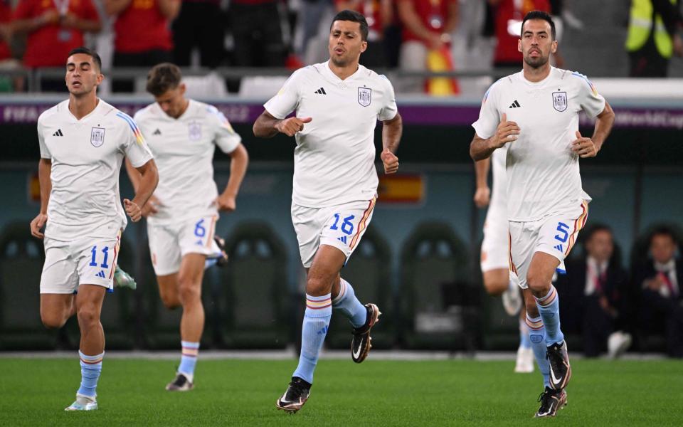 Spain's forward #11 Ferran Torres, Spain's midfielder #16 Rodri and Spain's midfielder #05 Sergio Busquets - AFP