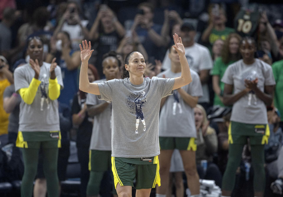 Seattle Storm guard Sue Bird (10) is honored before the team's WNBA basketball game against the Minnesota Lynx on Friday, Aug. 12, 2022, in Minneapolis. (Elizabeth Flores/Star Tribune via AP)